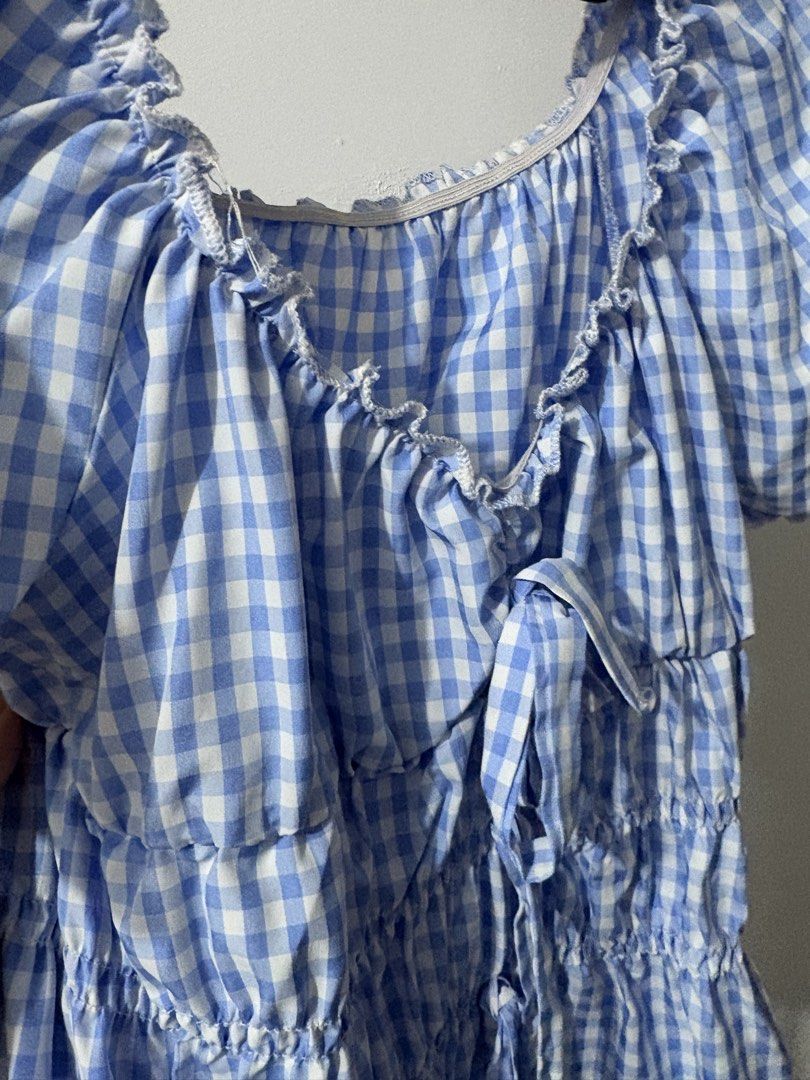 Blue and White Gingham Smocked Crop Top (Category: Blouses) located in Bulacan. Submitted by eloisereyes (Listing ID 1467750178, Image 3). Description: Size Small but can fit small - semi large body frame - Fit: Fully smocked, stretchy bodice - Condition: Worn a couple of times, still in great shape.