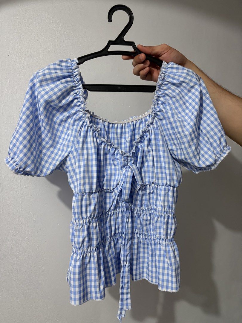 Blue and White Gingham Smocked Crop Top (Category: Blouses) located in Bulacan. Submitted by eloisereyes (Listing ID 1467750178, Image 1). Description: Size Small but can fit small - semi large body frame - Fit: Fully smocked, stretchy bodice - Condition: Worn a couple of times, still in great shape.