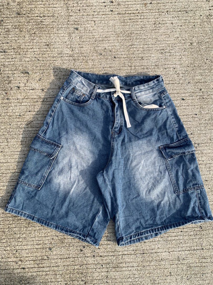 Blue Denim Cargo Shorts with Drawstring Waist (Category: Shorts) located in Iloilo. Submitted by johnpullan30303 (Listing ID 1467610975, Image 2). Description: - Style: Casual streetwear blue denim cargo shorts - Finish: Trendy washed finish with a relaxed fit - Waist: Adjustable white drawstring tie - Storage: Multiple functional pockets on the sides and back - Condition: Brand new / Excellent quality - Perfect for: Daily lakad, tambay, and casu