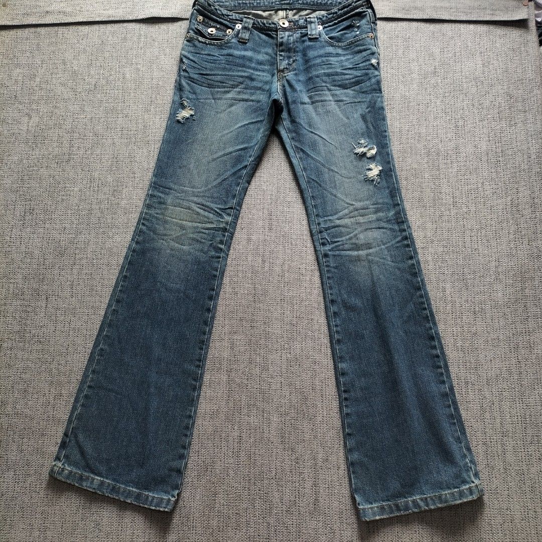Blue Distressed Boot cut Jeans Denim Pants (Category: Jeans) located in Taytay. Submitted by calmtree-6248 (Listing ID 1467637267, Image 1). Description: - Style: Classic Y2K mid-rise flare jeans - Details: Whiskering, distressed knees/legs, and slight thigh fading - Closure: Metal button fly - Measurements: Waist width ~16", Total length ~42", Inseam ~31.5" - Condition: Excellent, ready to wear.
