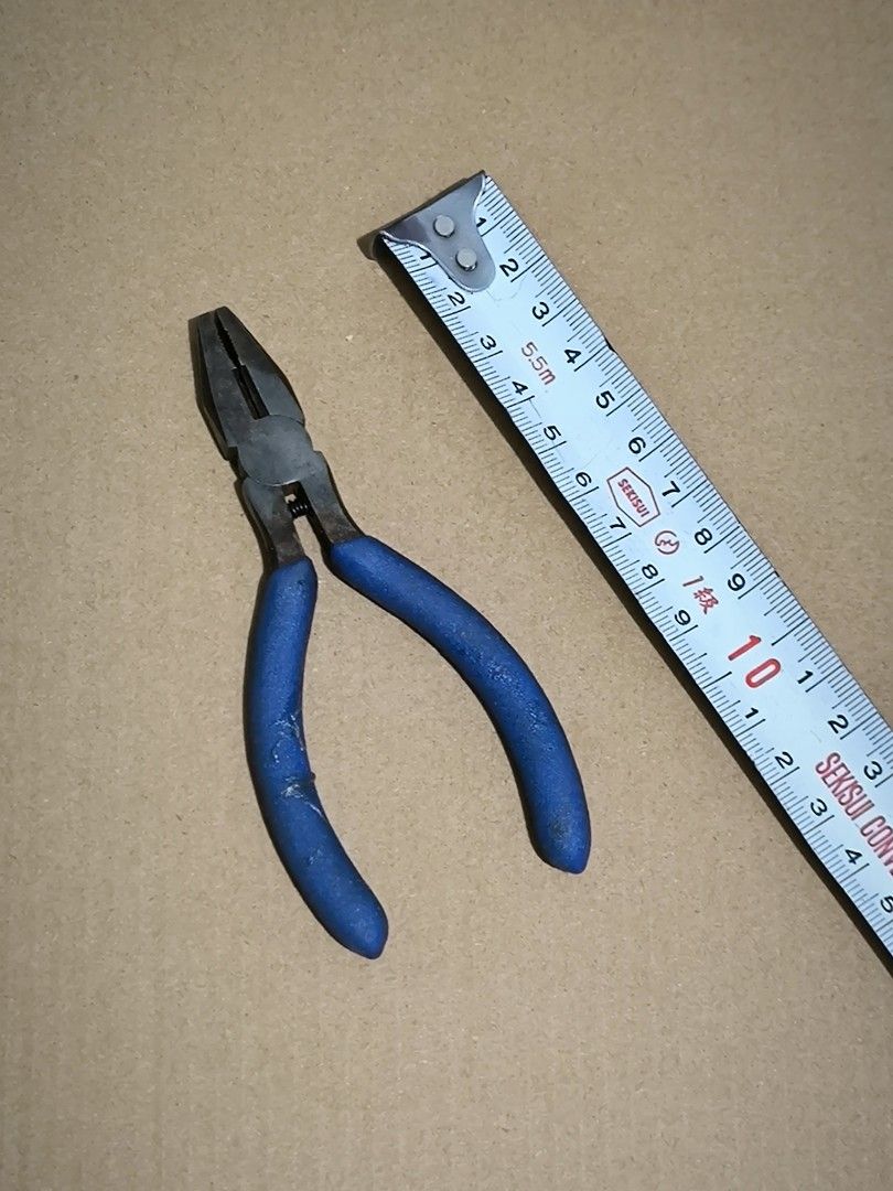 Blue handle combination pliers with return spring (Category: Home Improvement Tools & Accessories) located in Angeles City. Submitted by yellowbrickstore (Listing ID 1467685571, Image 1). Description: - Compact combination pliers, fits easily in any tool belt or pouch - Blue rubber grips for comfortable handling - Built-in return spring near the pivot for easy one-handed operation - Textured jaws provide a strong grip for bending, holding, and wi