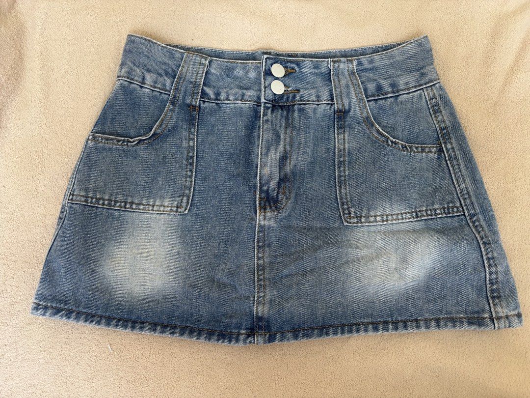 Blue High waist denim mini skirt (Category: Skirts) located in Pasig City. Submitted by llovedbyliv (Listing ID 1467632633, Image 1). Description: Waist - 26in Length - 12in No issues With inner shorts.