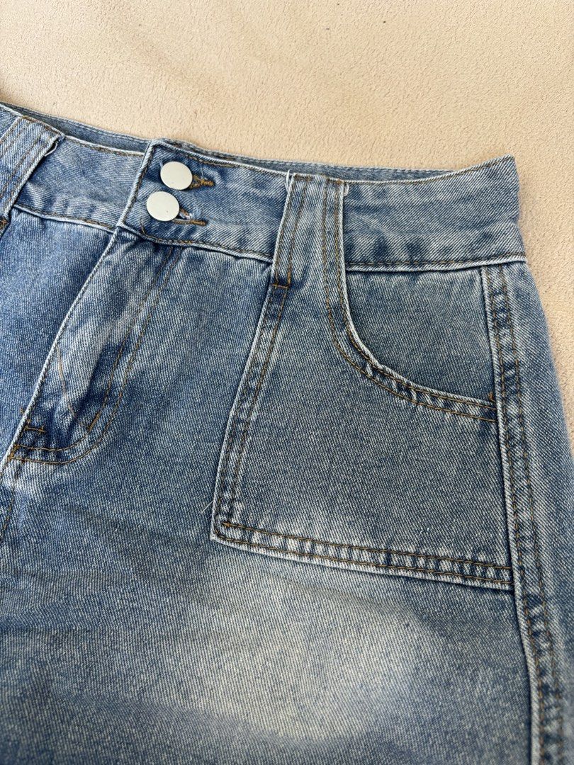 Blue High waist denim mini skirt (Category: Skirts) located in Pasig City. Submitted by llovedbyliv (Listing ID 1467632633, Image 2). Description: Waist - 26in Length - 12in No issues With inner shorts.
