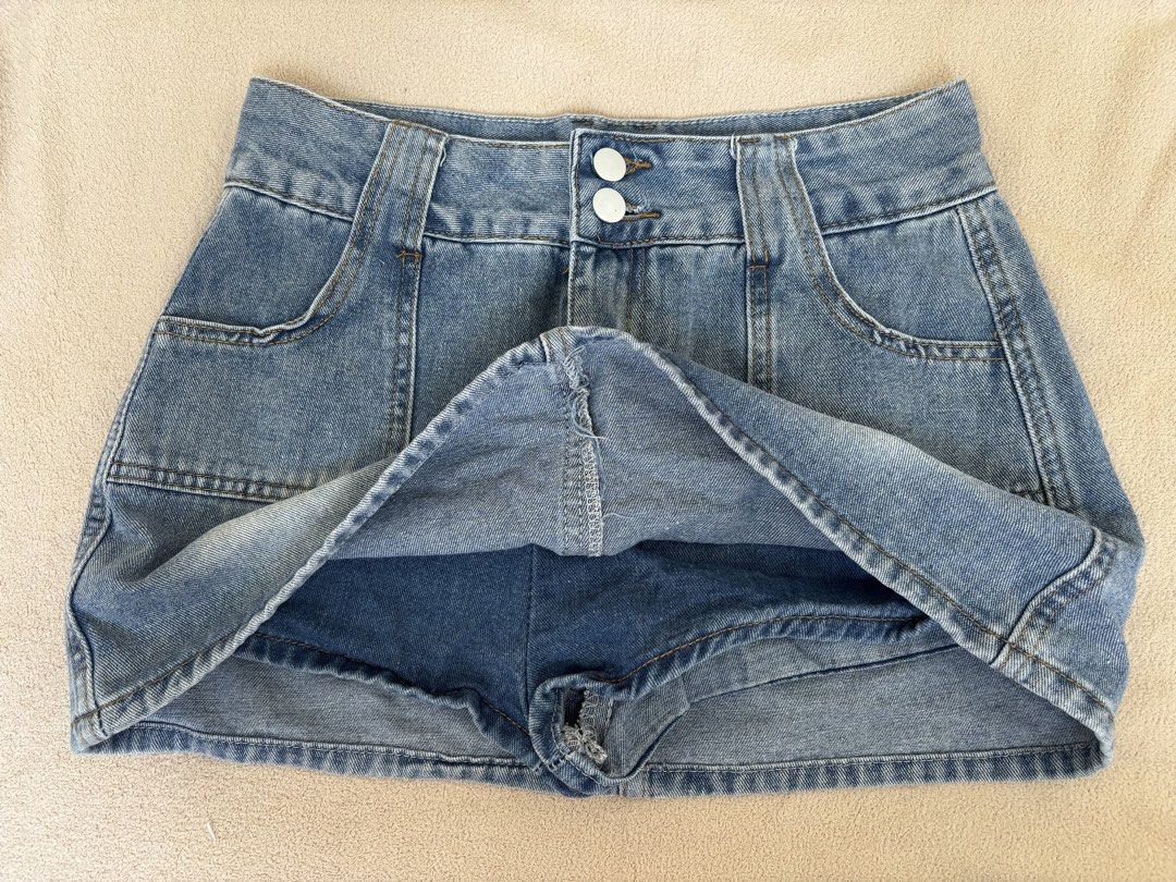 Blue High waist denim mini skirt (Category: Skirts) located in Pasig City. Submitted by llovedbyliv (Listing ID 1467632633, Image 3). Description: Waist - 26in Length - 12in No issues With inner shorts.