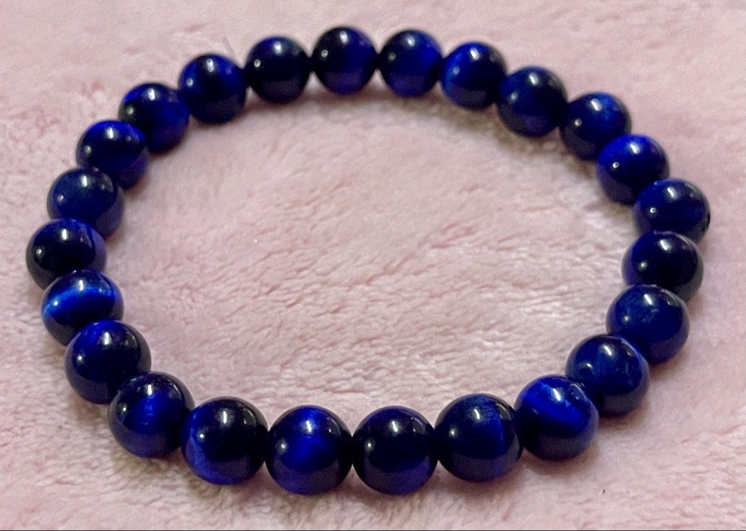 Blue Tiger Eye Bracelet 8mm (Category: Bracelets) located in Manila. Submitted by Crystal_Oracle (Listing ID 1467649895, Image 1). Description: A stone of protection, Tiger Eye may also bring good luck to the wearer. It has the power to focus the mind, promoting mental clarity, assisting us to resolve problems objectively and unclouded by emotions. Particularly useful for healing psychosomatic illnesses, dispelling fear and anxiety. Useful for re