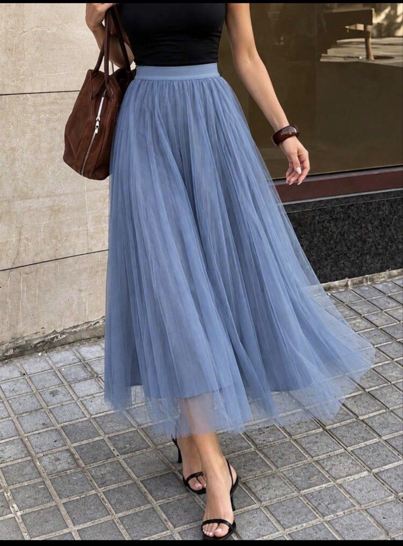 Blue Tulle Pleated Midi Skirt (Category: Skirts) located in Manila. Submitted by reicellpa20302 (Listing ID 1467744057, Image 1). Description: - Color: Dreamy blue - Style: Midi skirt with soft tulle layers and pleated design - Fit: Fitted waistband with beautiful flowing movement - Versatility: Easy to style up with heels or dress down with sneakers - Condition: Excellent Rfs: Used Once declutterring Gcash/Maribank/Chinabank Payment J&T/LBC Deli