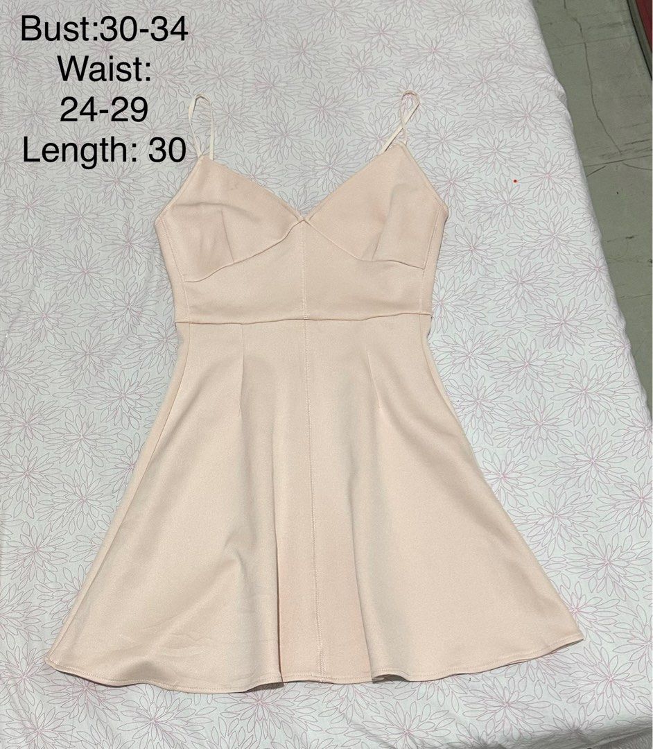 Blush pink spaghetti strap skater dress (Category: Dresses) located in Zamboanga. Submitted by thriftie.zam (Listing ID 1467755920, Image 1). Description: - Color: Blush pink - Style: Minimalist skater dress with spaghetti straps and V-neckline - Fit: Fitted bodice with a flared skirt - Measurements (inches): Bust 30-34, Waist 24-29, Length 30 - Perfect for: Casual outings, dates, and weekend lakwatsas.