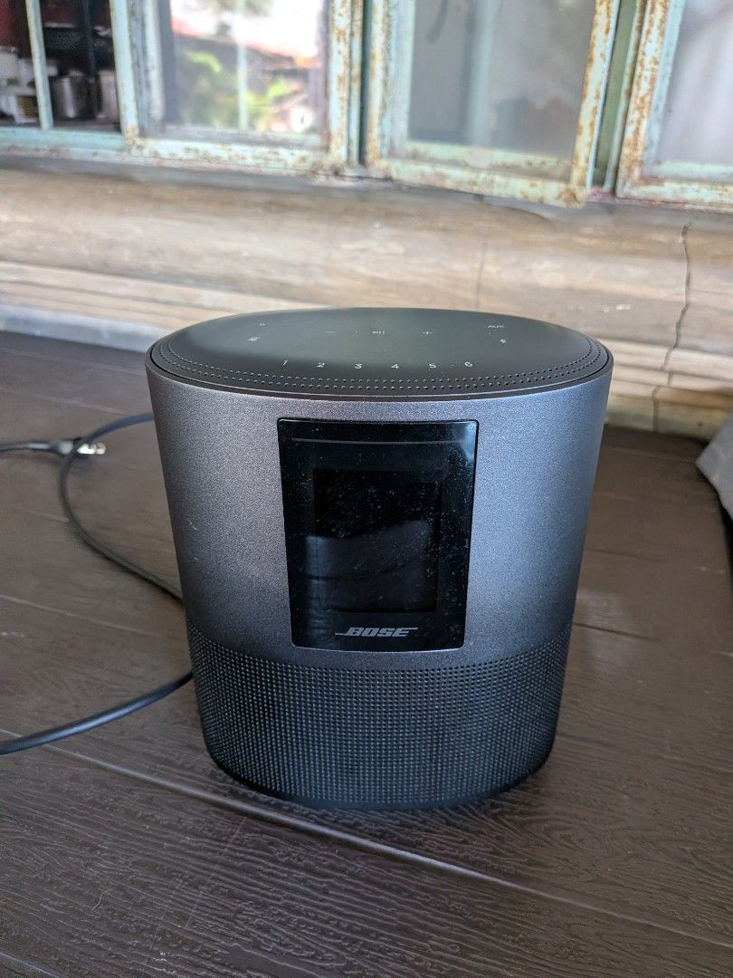 Bose Home Speaker 500 Wireless Smart Speaker (Category: Soundbars, Speakers & Amplifiers) located in San Jacinto. Submitted by jigssaw (Listing ID 1467620541, Image 1). Description: - Negotiable - Model: Bose Home Speaker 500 (Dark Grey/Black) - Condition: Working condition and authentic, tested with Bluetooth - Features: Front LCD screen, top touch controls, and preset buttons - Inclusions: Power cord included - Note: Clean unit with minor dust 