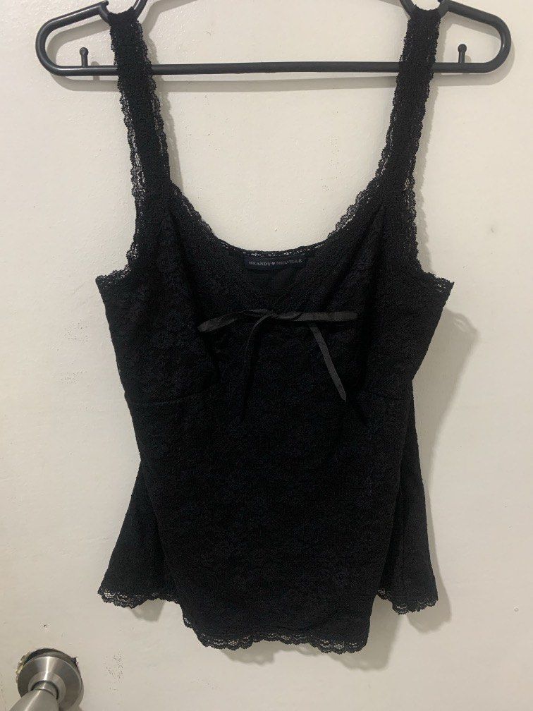 Brandy Melville black lace top (Category: Sleeveless) located in Manila. Submitted by zhyaieeee (Listing ID 1467627352, Image 1). Description: new no issue size xs-m.