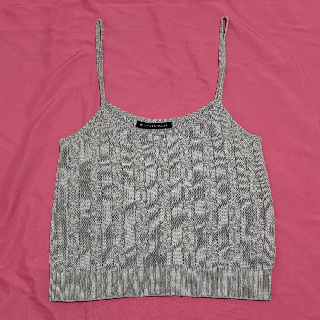 Brandy Melville Gray Cable Knit Tank Top (Category: Sleeveless) located in Quezon City. Submitted by luna_ily (Listing ID 1467773857, Image 1). Description: 🍒 Send a message for more pictures and inquiries. Location: Cubao, Quezon City Mode of delivery: J&T and Lalamove (shipping fee will be shouldered by the buyer) Mode of payment: GCash, Maya, GoTyme.