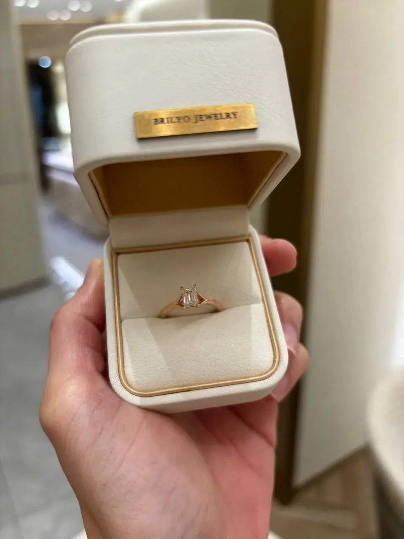 Brilyo Jewelry Emerald Cut Diamond Solitaire Ring (Category: Rings) located in Cainta. Submitted by dark_angel1824 (Listing ID 1467731276, Image 1). Description: Perfect for Engagement Ring 💍 Never worn - Brand: Brilyo Jewelry Bought it in Shangrila Store - Stone: Emerald cut Size 4 - Band: Slender rose gold with unique split shank prongs With paperbag and box💯 .