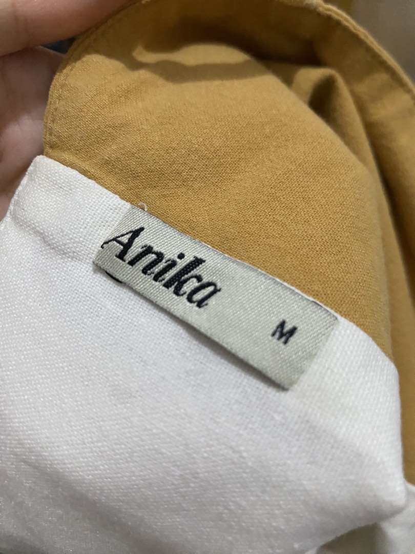 Brown and White Striped Asymmetrical Crop Top (Category: Others Tops) located in Quezon City. Submitted by addy_addy (Listing ID 1462815816, Image 2). Description: - Cute asymmetrical crop top - Bold brown and white stripe pattern - Breathable, light linen-blend fabric - Ideal for casual outings or beach trips - Versatile: pairs easily with shorts or skirts - Approximate measurements: •Bust (A-cut): 44 cm (upper hem); 48 cm (lower hem) • Length: 