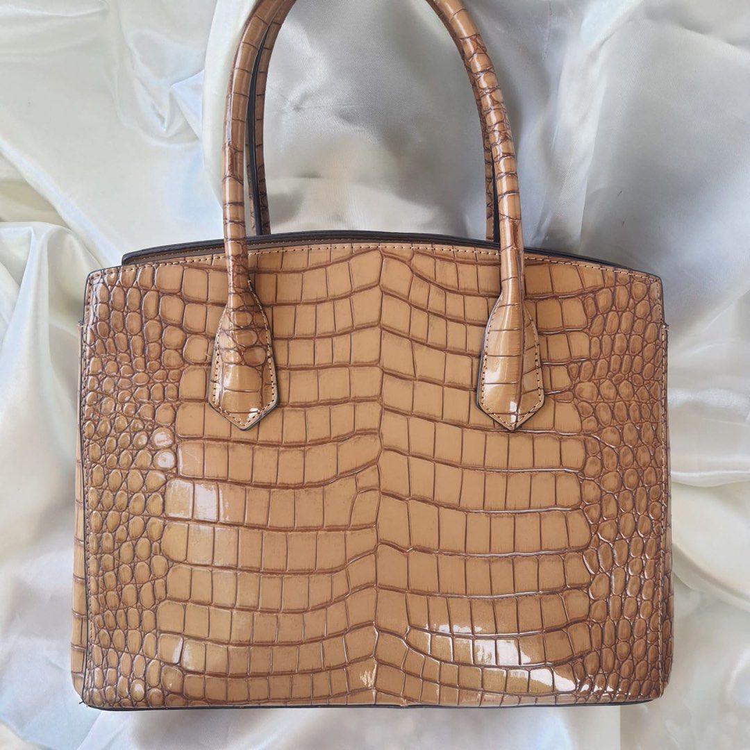 Brown Bag 31cm With Sling (Category: Shoulder Bags) located in Paranaque City. Submitted by shopshineph (Listing ID 1467737792, Image 2). Description: Brown croc skin handbag 31cm With many pockets Sling included With dust bag Bought for PHP 5K Selling for PHP 2,900 GCash / bank transfer Lalamove delivery Meetup: Newport World Resorts.