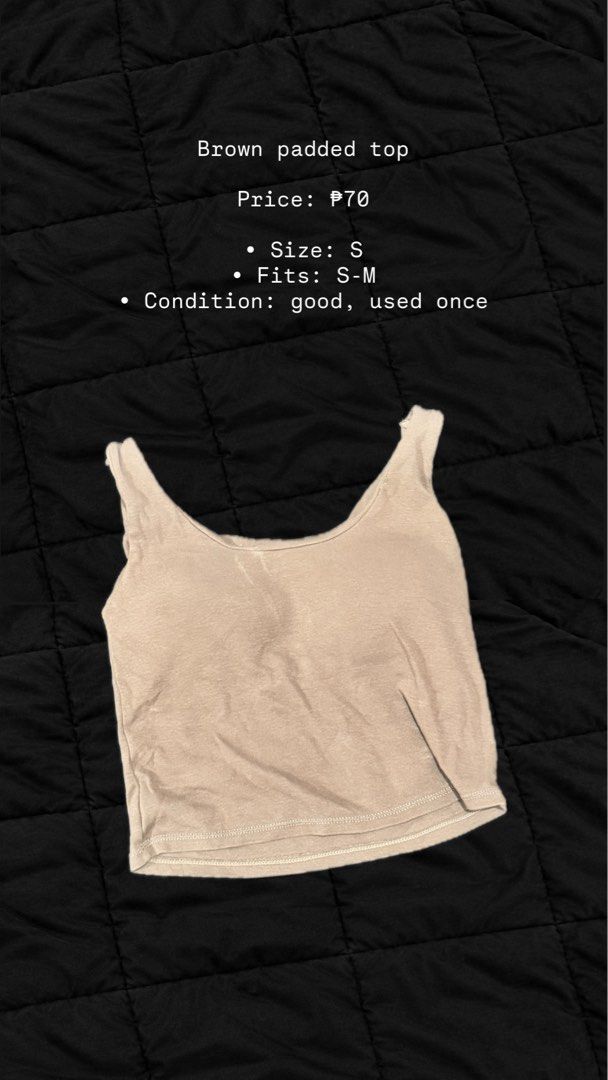 Brown Padded Top Size S fits S-M (Category: Sleeveless) located in Las Pinas. Submitted by prelovedgoodiesph (Listing ID 1467725342, Image 1). Description: - Color: Brown - Size: Tagged S (fits S to M comfortably) - Style: Sleeveless scoop neckline crop top - Feature: Built-in padding (bra-free convenience) - Condition: Worn once, like new, no flaws - Perfect for pairing with high-waisted jeans or skirts.