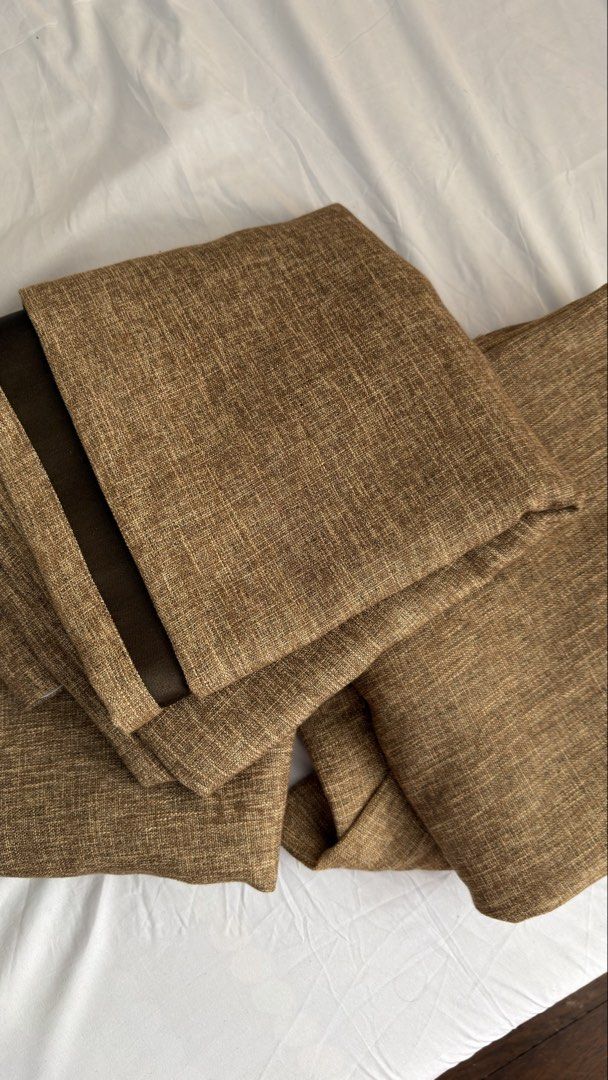 Brown textured curtains with dark brown lining (Category: Curtains & Blinds) located in Pasig City. Submitted by _missdee (Listing ID 1467671415, Image 1). Description: - Color: Brown woven fabric with dark brown smooth lining - Light Blocking: Thick material designed to effectively block out light - Quality: Premium, thick build for durability - Versatility: Neutral earth tones complement most living room and bedroom setups - Condition: Clean, w