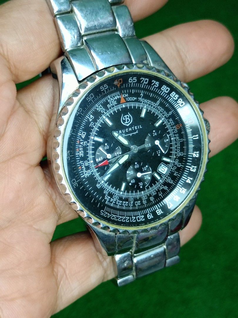 Bruchteil Chronograph BT401M Men's Watch (Category: Men's Watches) located in Bacoor. Submitted by bibelot03 (Listing ID 1467760596, Image 3). Description: - Brand/Model: Bruchteil Chronograph BT401M men's wrist watch - Material: Stainless steel case and bracelet band - Dial: Black layout with multiple sub-dials, slide rule bezel, and date window at the bottom right - Movement & Water Resistance: Reliable quartz movement with 5 ATM water resistan