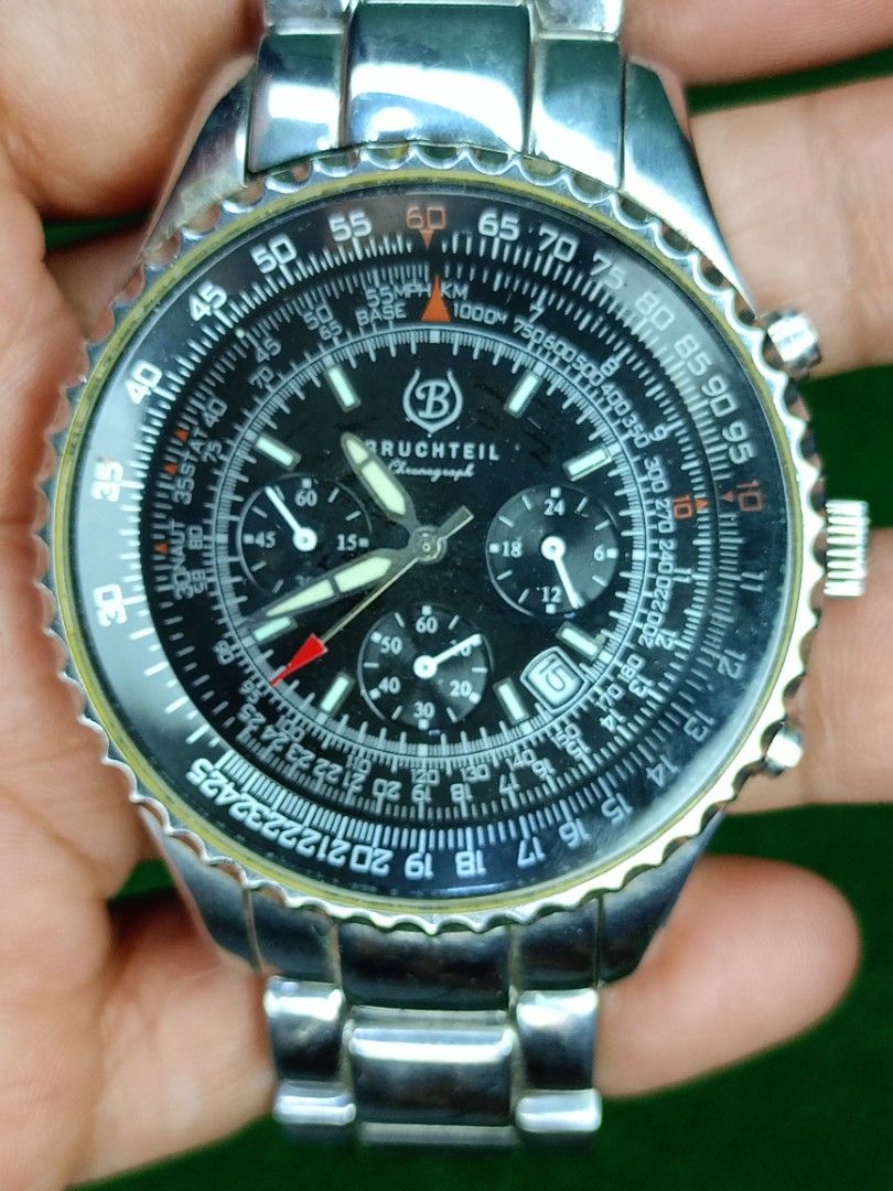 Bruchteil Chronograph BT401M Men's Watch (Category: Men's Watches) located in Bacoor. Submitted by bibelot03 (Listing ID 1467760596, Image 1). Description: - Brand/Model: Bruchteil Chronograph BT401M men's wrist watch - Material: Stainless steel case and bracelet band - Dial: Black layout with multiple sub-dials, slide rule bezel, and date window at the bottom right - Movement & Water Resistance: Reliable quartz movement with 5 ATM water resistan