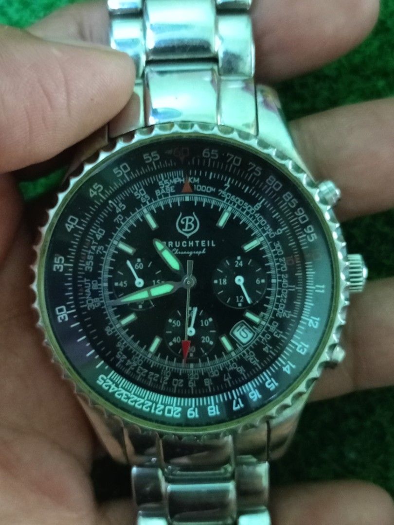 Bruchteil Chronograph BT401M Men's Watch (Category: Men's Watches) located in Bacoor. Submitted by bibelot03 (Listing ID 1467760596, Image 2). Description: - Brand/Model: Bruchteil Chronograph BT401M men's wrist watch - Material: Stainless steel case and bracelet band - Dial: Black layout with multiple sub-dials, slide rule bezel, and date window at the bottom right - Movement & Water Resistance: Reliable quartz movement with 5 ATM water resistan