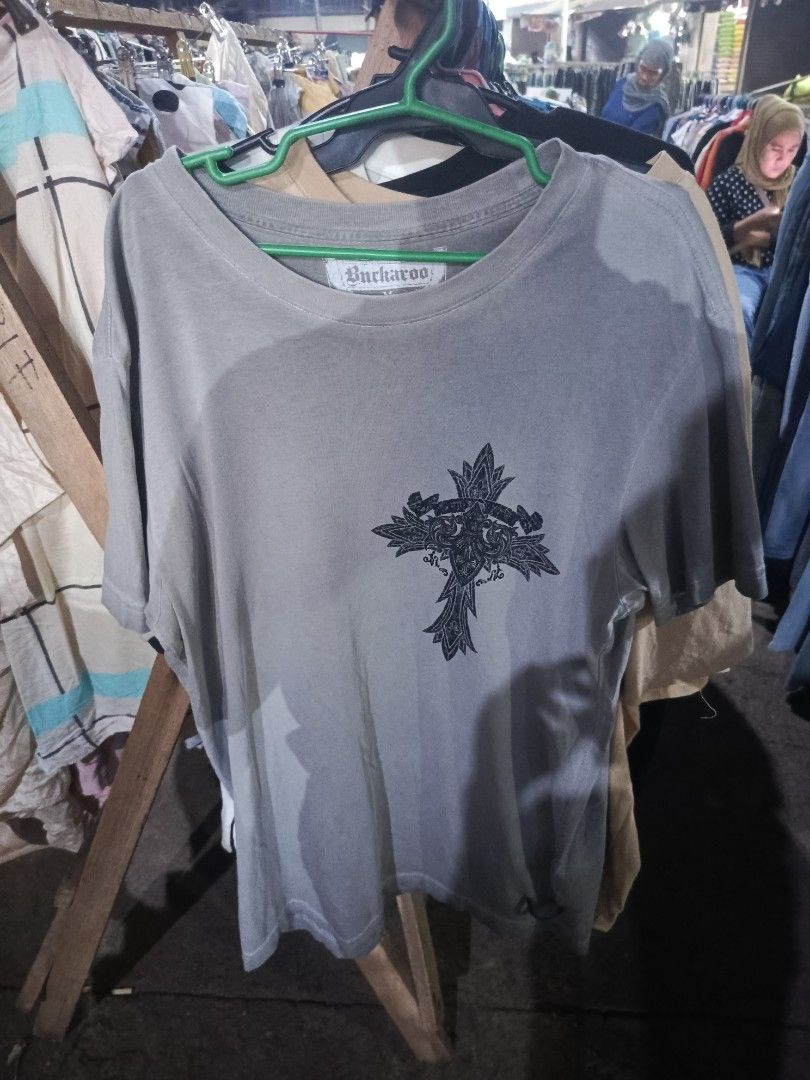 Buckaroo Graphic T-Shirt Grey (Category: Tshirts & Polo Shirts ) located in City of Isabela. Submitted by warmbird.d06e6f (Listing ID 1467715167, Image 2). Description: Grey Buckaroo t-shirt with large cross and wings graphic print on the back. Smaller matching cross graphic on the front chest. Short sleeves, crew neck. Cotton material. Standard fit casual tee. pm sa dimes.