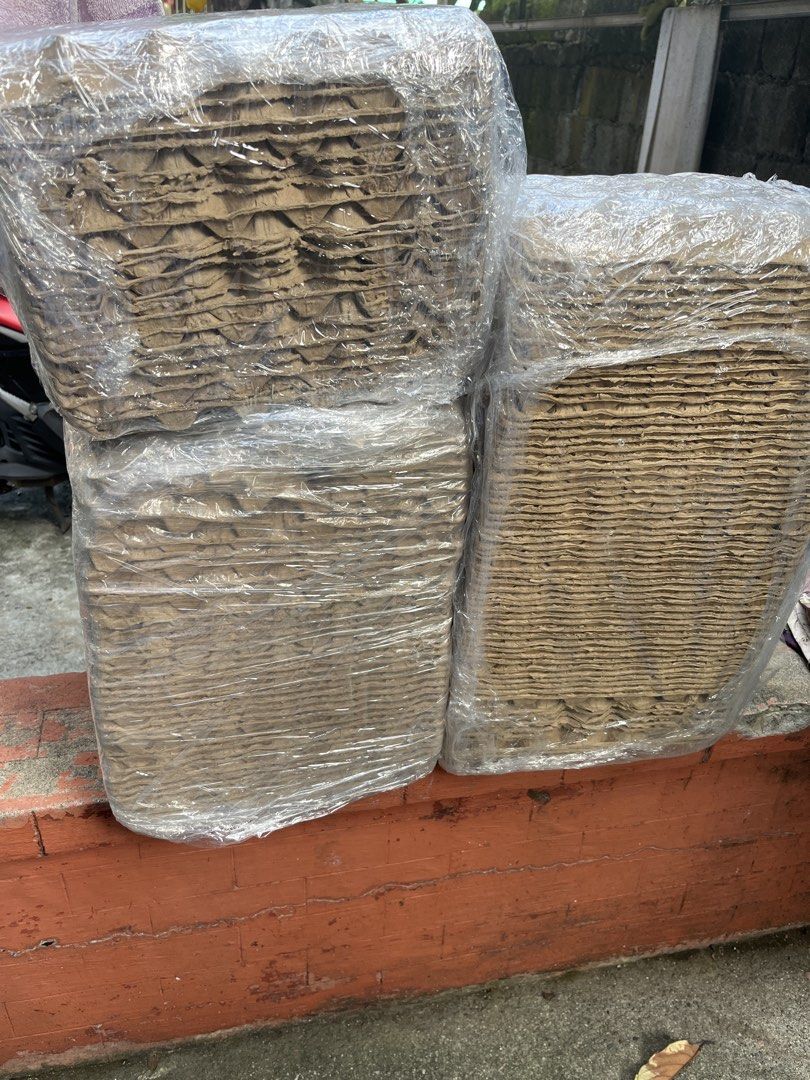 Bulk Egg Trays Paper Pulp Cartons Stacked Plastic Wrapped (Category: Storage Boxes & Baskets) located in Quezon City. Submitted by altheakatecollection (Listing ID 1467674137, Image 1). Description: 110 pax egg trays - Standard size molded paper pulp egg trays - Clean, dry, and ready for immediate use - Wrapped tightly in clear plastic film for safe transport and storage - Ideal for poultry farms, wet markets, egg collection, and DIY crafts - Ava