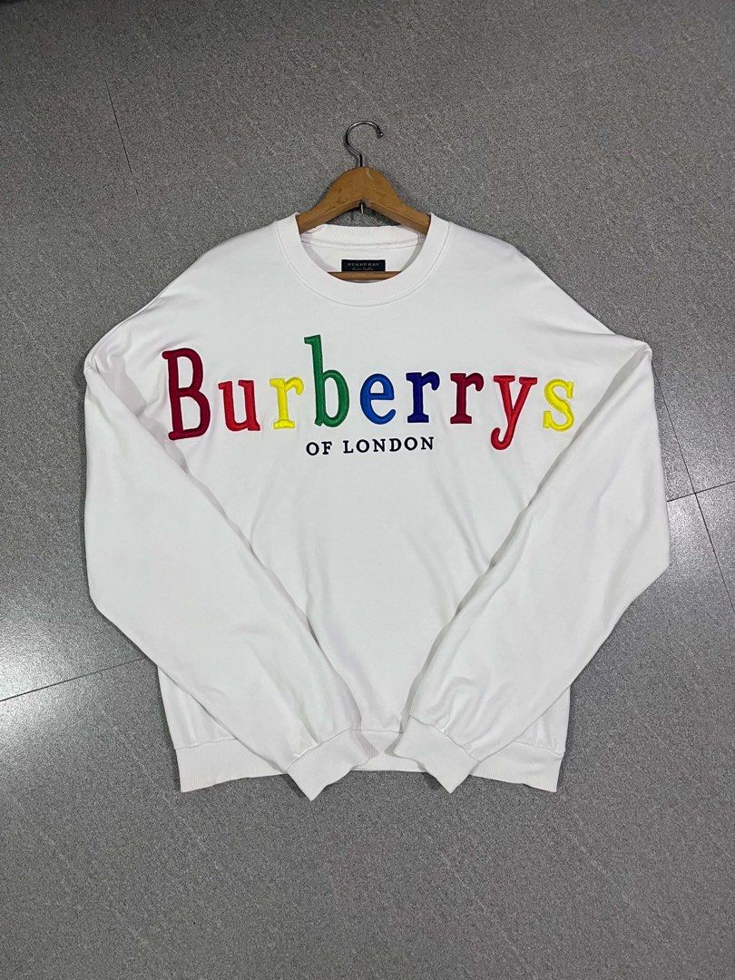 Burberry Multicolors Script White Longsleeve (Category: Tshirts & Polo Shirts ) located in Manila. Submitted by thriftniotits (Listing ID 1467743021, Image 1). Description: - XL ob tag - No issue - Embroided - Dimes - 24x28 Pm for more details!.