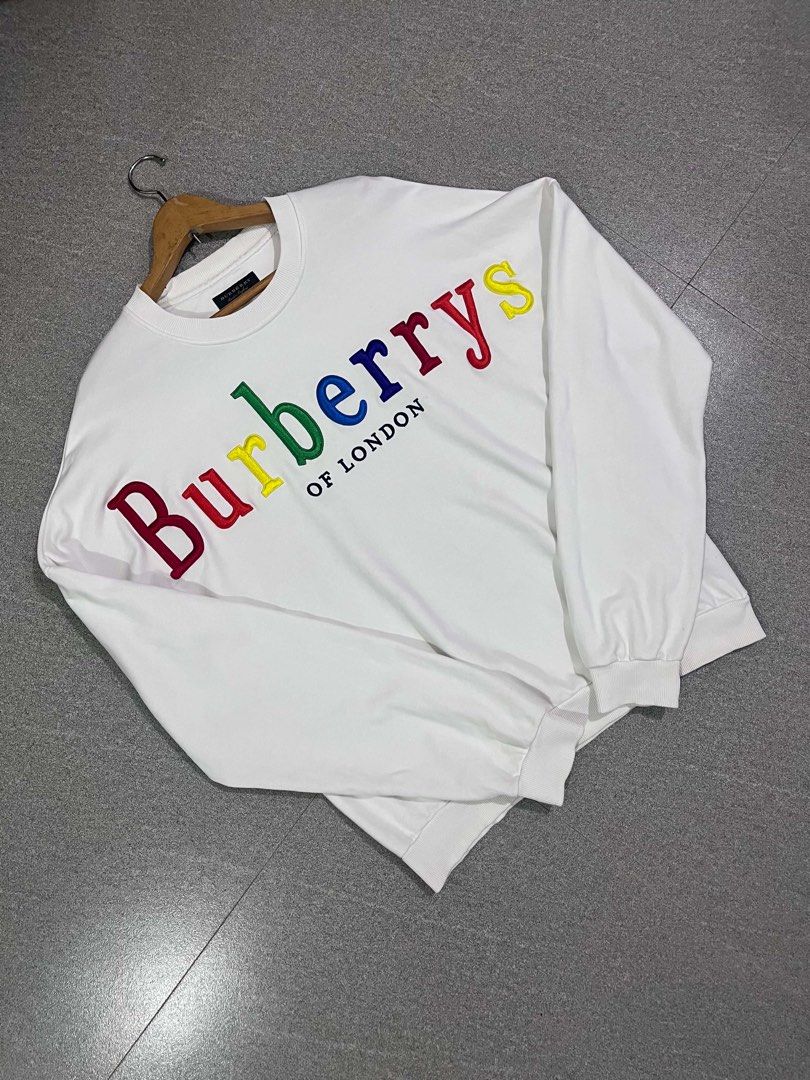 Burberry Multicolors Script White Longsleeve (Category: Tshirts & Polo Shirts ) located in Manila. Submitted by thriftniotits (Listing ID 1467743021, Image 2). Description: - XL ob tag - No issue - Embroided - Dimes - 24x28 Pm for more details!.