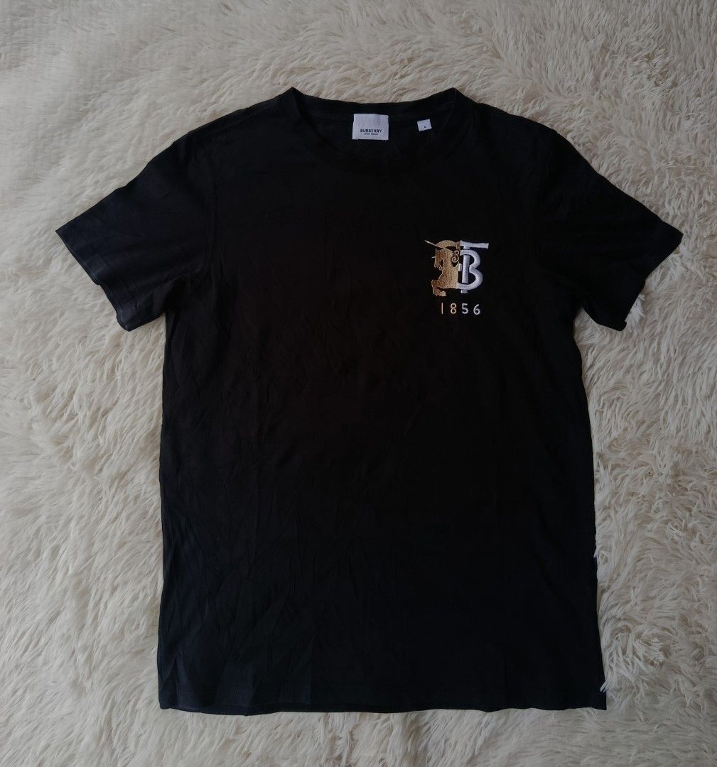 Burberry TB Logo (Category: Tshirts & Polo Shirts ) located in Davao. Submitted by VFinds414 (Listing ID 1467660840, Image 1). Description: Burberry TB Logo Medium on tag best fit Small 18.5 Width / 26 Length Excellent Condition 549 add ship.