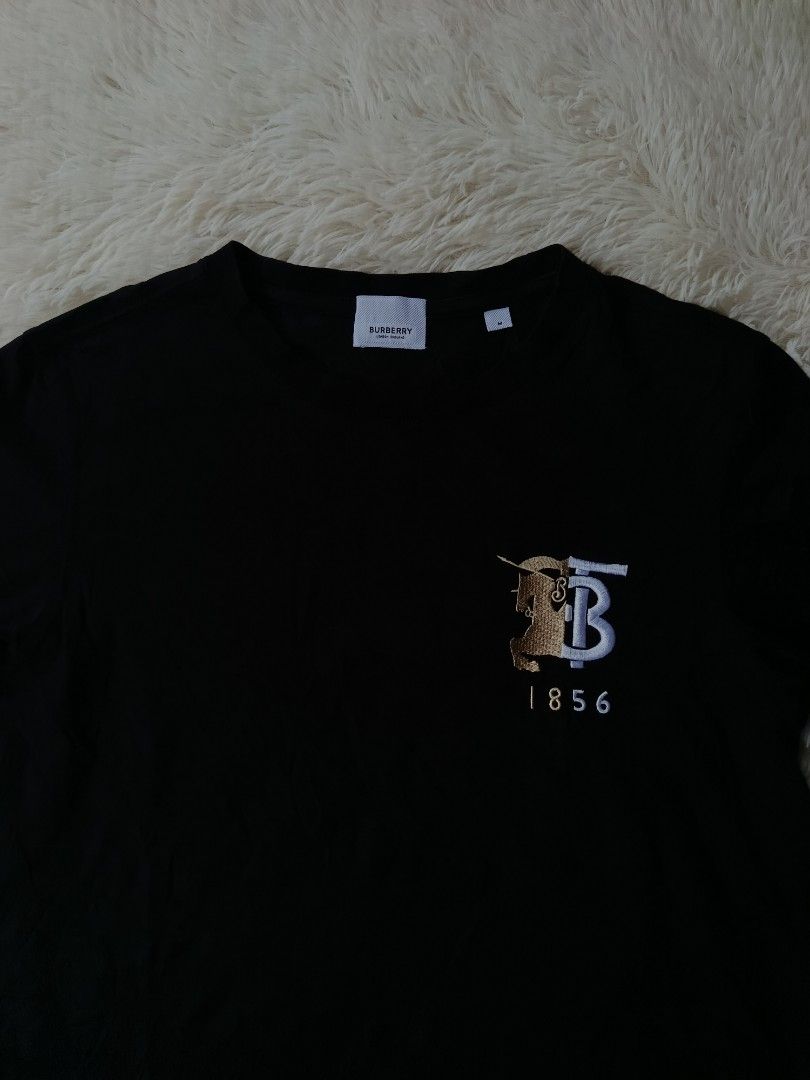 Burberry TB Logo (Category: Tshirts & Polo Shirts ) located in Davao. Submitted by VFinds414 (Listing ID 1467660840, Image 2). Description: Burberry TB Logo Medium on tag best fit Small 18.5 Width / 26 Length Excellent Condition 549 add ship.