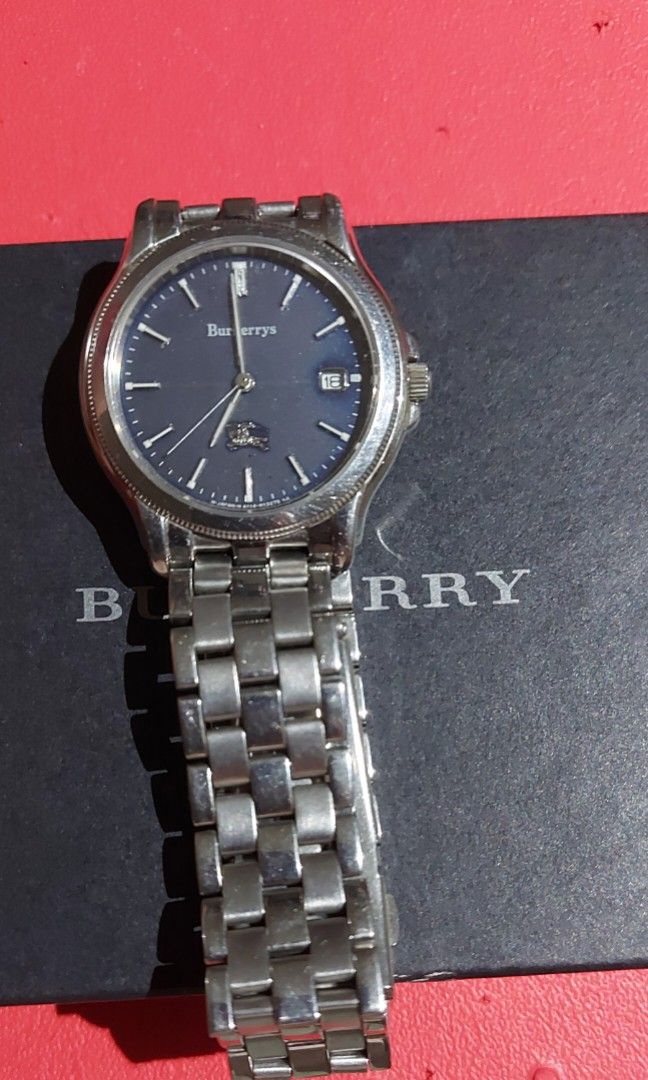 Burberrys quartz watch (Category: Men's Watches) located in Quezon City. Submitted by threetwotwo2ndaccount (Listing ID 1467833524, Image 1). Description: Burberrys quartz watch with box only working from japan bawal sa maselan bawal sa barat.