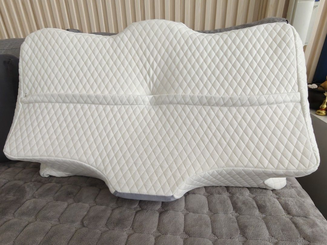 Butterfly Memory Foam Pillow (Category: Bedding & Towels) located in Pasig City. Submitted by phonefanatic (Listing ID 1467628885, Image 2). Description: Butterfly Memory Foam Pillow Dimension: 60 cm by 40 cm by 14 cm Ergonomic Orthopedic Side Sleeping Support Pillow.