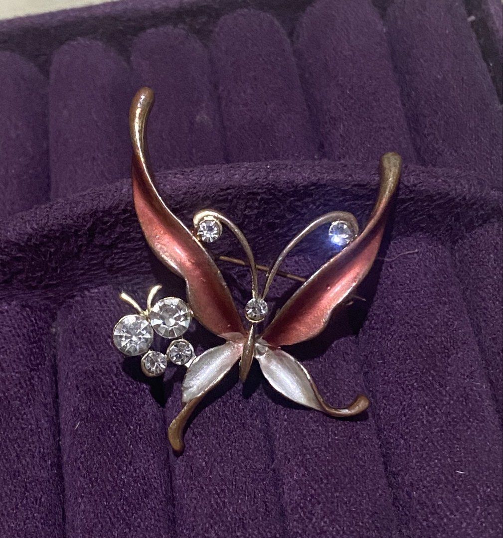 Butterfly Rhinestone Enamel Brooch Pin (Category: Brooches) located in Caloocan City. Submitted by sheng5207418 (Listing ID 1467814497, Image 1). Description: - Design: Charming butterfly - Details: Sparkly clear rhinestones along the wings and body - Closure: Metal backing with a secure, working pin - Styling: Versatile accessory for jackets, scarves, or bags - Condition: Good working order, ready to wear - Japan Accessories .