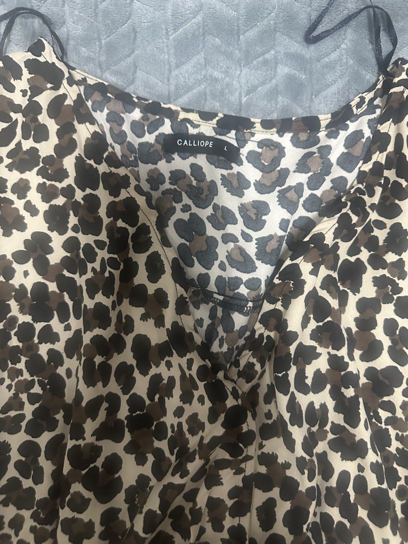 Calliope - Leopard print dress (Category: Dresses) located in Caloocan City. Submitted by fabs_preloved01 (Listing ID 1467769865, Image 3). Description: Calliope Leopard dress - size L - 40” length .
