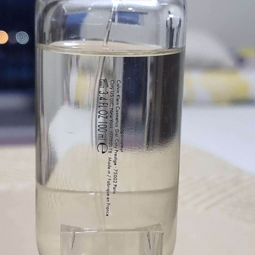 Calvin Klein CK2 Eau de Toilette (100 ml) (Category: Fragrance & Deodorants) located in Pasig City. Submitted by lesmitch (Listing ID 1467642926, Image 3). Description: - Authentic Calvin Klein CK2 Eau de Toilette - 85% Full | 100ml / 3.4 fl oz full-size bottle - Made in France by Coty Prestige - Sleek minimalist clear cylinder design with integrated transparent stand - Perfect for everyday casual wear or as a collector's piece ~ Check all photos