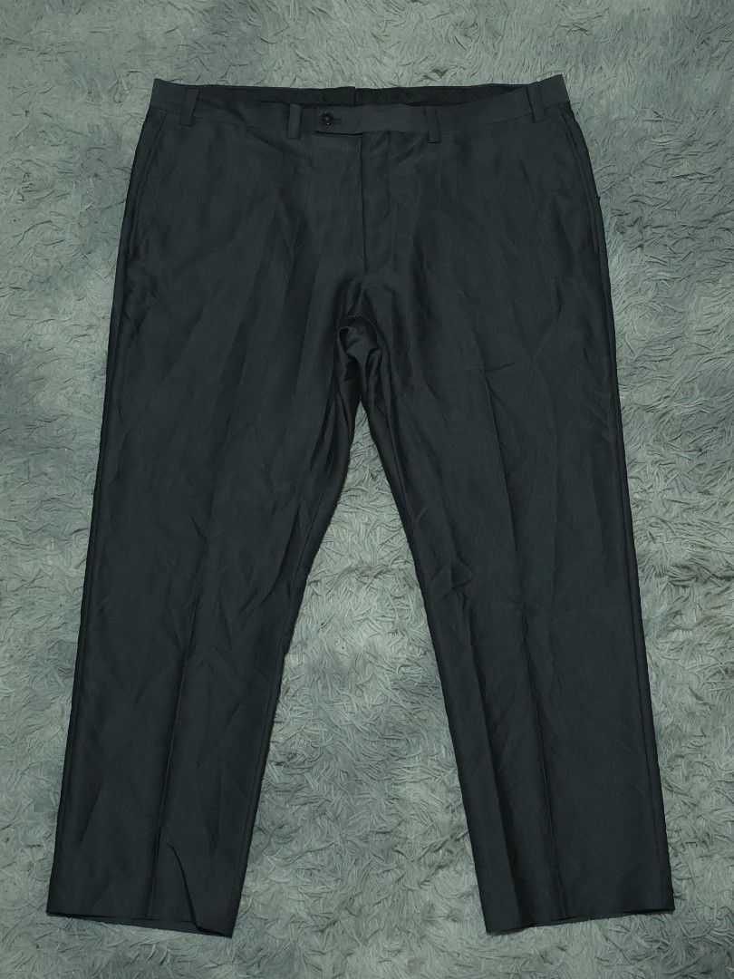 Calvin Klein Dark Grey Formal Trousers Pants (Category: Trousers) located in Abulug. Submitted by humanwhosellthings (Listing ID 1467640018, Image 1). Description: CALVÌN KLEIN Trouser Pants ✅Excellent Condition ✅Issue: none ▫️Waist Size: 38-40 ▫️Length: 38 - Fit: Straight cut design - Features: Belt loops, zip fly with button closure - Pockets: Two back pockets with button fastening - Ideal for: Office wear and formal events.