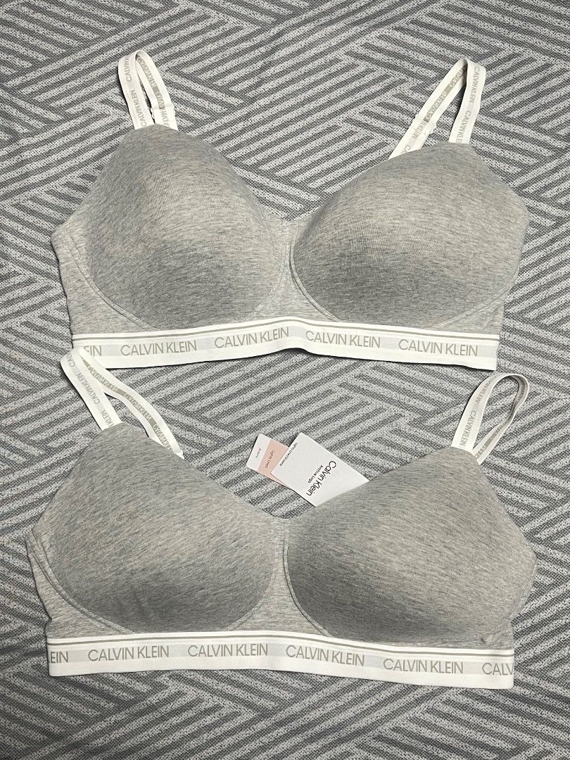 Calvin Klein Grey Cotton Logo Underwire Bras (Category: Undergarments & Loungewear) located in Subic. Submitted by anything_lovely_under_the_sun (Listing ID 1467757332, Image 1). Description: - Brand new with original retail tags attached - Pack of two grey Calvin Klein bras - Size: XL - Signature logo elastic band and straps - Supportive underwire cups with hook-and-eye back closure.