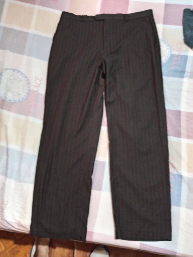 Calvin Klein trousers (Category: Trousers) located in Marikina City. Submitted by cherrybone (Listing ID 1467672045, Image 1). Description: Color: dark brown.