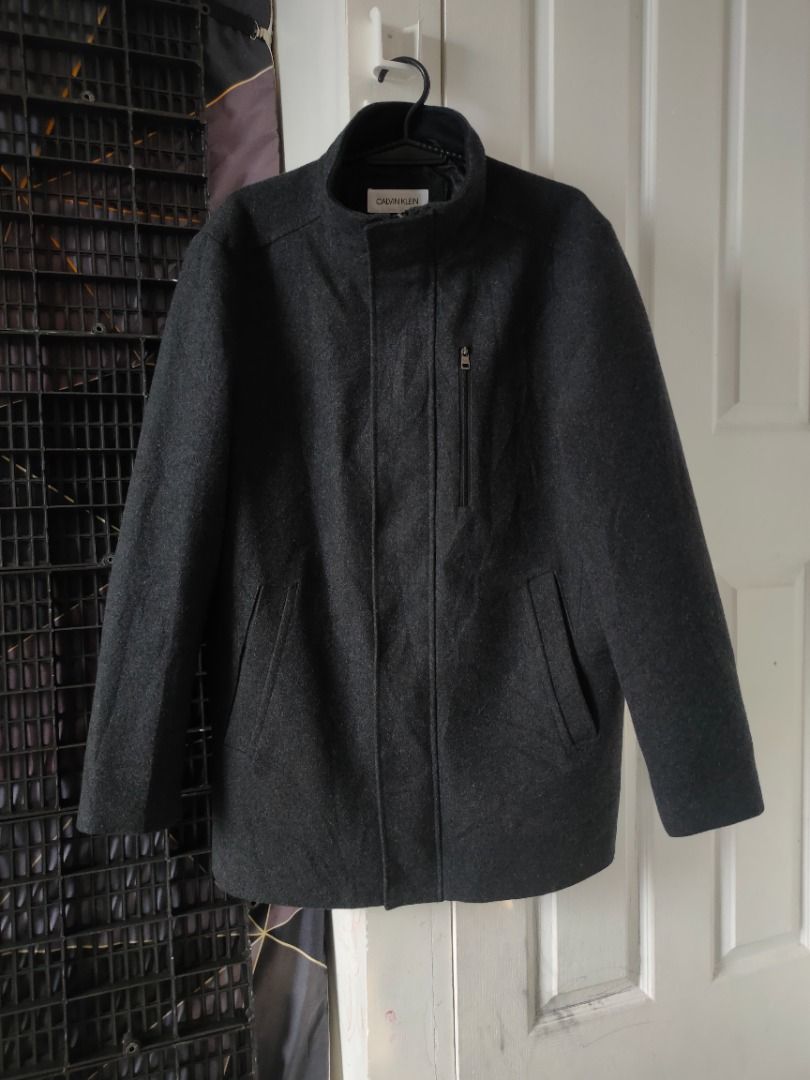 Calvin Klein Wool Coat Jacket - Medium (Category: Coats, Jackets and Outerwear) located in Dasmarinas. Submitted by acesteve (Listing ID 1467754222, Image 1). Description: Size in inches: 23 width 32.5 length No issues or alterations Loc: Dasma Cavite MOP: Gcash.