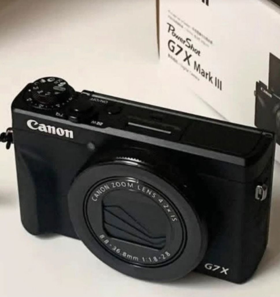 Canon PowerShot G7 X Mark III Digital Camera (Category: Cameras) located in Caloocan City. Submitted by wilddeer_094ef3 (Listing ID 1467678268, Image 3). Description: - Model: Canon PowerShot G7 X Mark III Compact Digital Camera - Color: Sleek Black - Lens: 8.8-36.8mm zoom lens with a bright f/1.8-2.8 aperture range - Screen: Flip-up LCD screen (ideal for selfies and vlogging) - Controls: Top plate dial buttons for easy setting adjustments - Incl