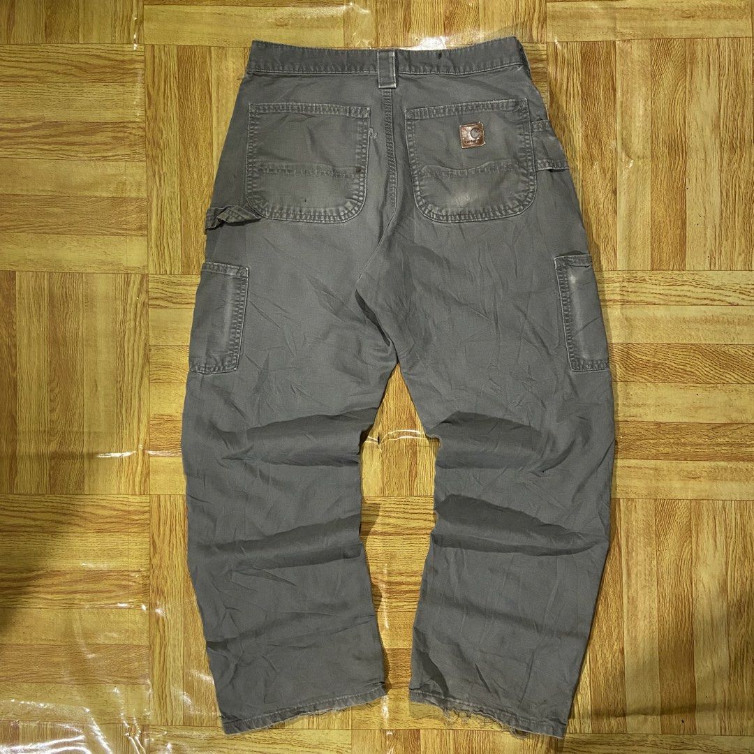 Carhartt Carpenter Pants (Category: Activewear) located in Dasmarinas. Submitted by thrift2gems (Listing ID 1467603796, Image 1). Description: Carhartt Carpenter Pants✨ -WIDTH: 29 -LENGTH: 37 -THIGH: 11.5 -LEG OPENING: 8 -COLOR RATE: 9/10 -CONDITION: 9/10 -ISSUE: CHECK PICS.