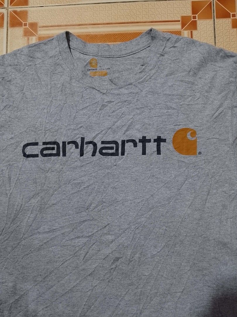 Carhartt script tee (Category: Tshirts & Polo Shirts ) located in Alburquerque. Submitted by ayrelieonlineshop (Listing ID 1467651616, Image 3). Description: Carhartt script tee size large dimensions W-22 L-30 excellent condition no pinhole or punit no cracks print.