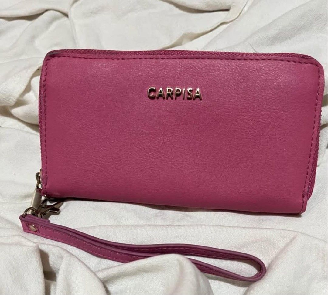 Carpisa Pink Zip Around Wallet With Wrist Strap (Category: Wallets & Card holders) located in Taguig. Submitted by mikacxz (Listing ID 1467732399, Image 2). Description: - never used - rfs: decluttering .