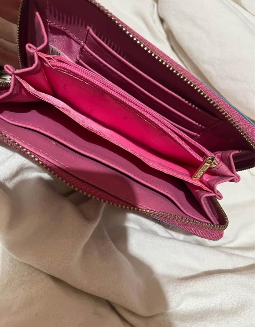 Carpisa Pink Zip Around Wallet With Wrist Strap (Category: Wallets & Card holders) located in Taguig. Submitted by mikacxz (Listing ID 1467732399, Image 3). Description: - never used - rfs: decluttering .