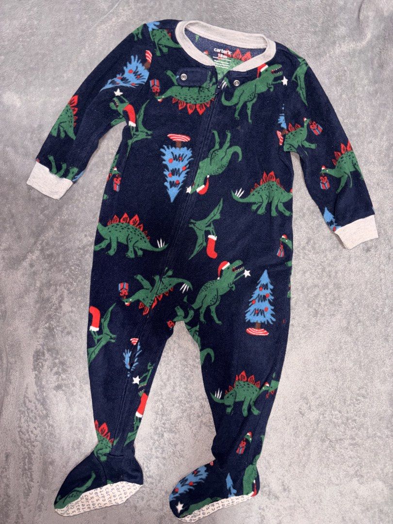 Carter's Christmas Dinosaur Fleece (Category: Babies & Kids Fashion) located in Quezon City. Submitted by closettreasure123 (Listing ID 1467677547, Image 1). Description: Flaw: torn seam right next to the zipper tape (as seen on the 3rd pic) just needs sewing Full-body sleeper with attached footies, a full-length safety zipper stretching from the collar down to the leg, and a snap-tab closure over the zipper tab at the neckline to protect delicat