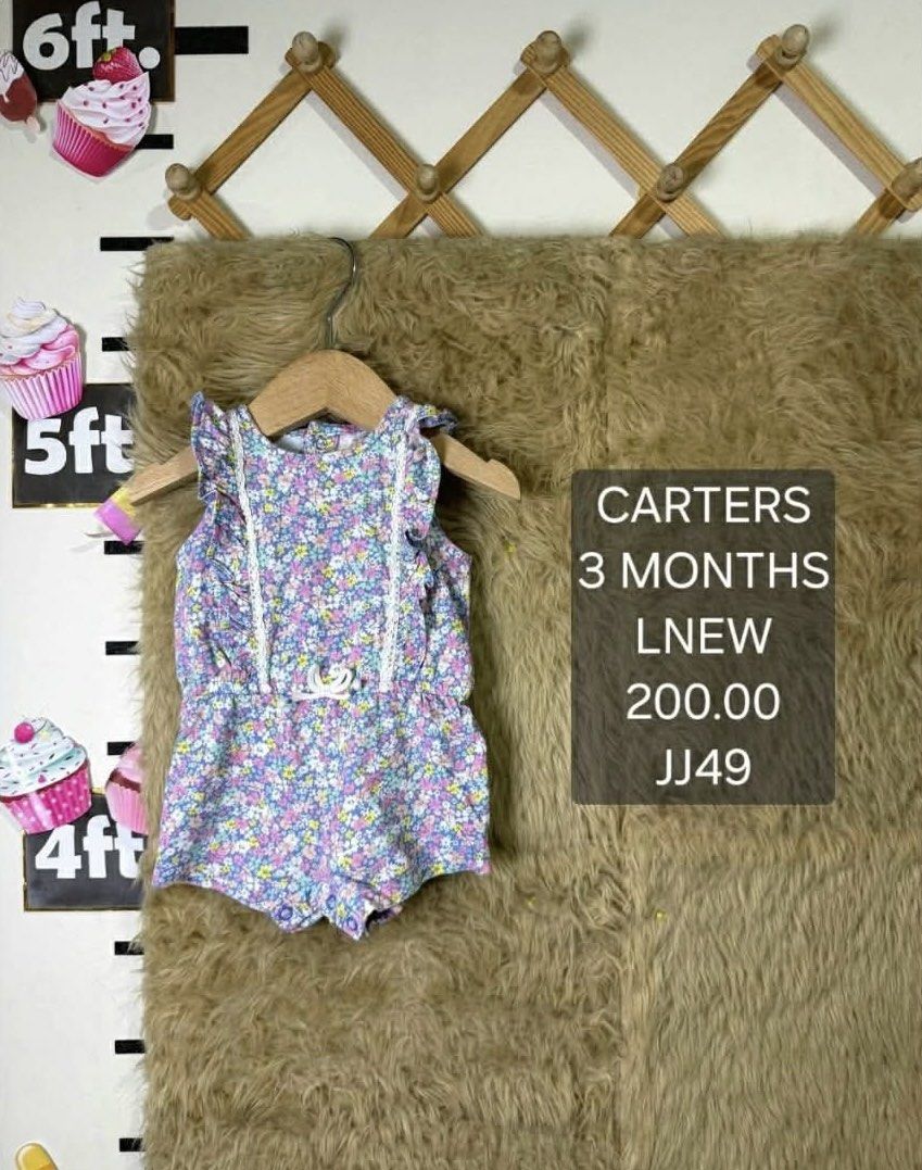 Carter's Floral Romper 3 Months (Category: Babies & Kids Fashion) located in Jaen. Submitted by kmg0219 (Listing ID 1467610204, Image 1). Description: - Brand: Carter's - Size: 3 months - Design: Purple and multi-color floral print with ruffle sleeves and white lace trim - Features: Small decorative waist tie, convenient bottom snap buttons for easy diaper changes - Material: Super soft and lightweight, perfect for everyday wear - Condition: Exce