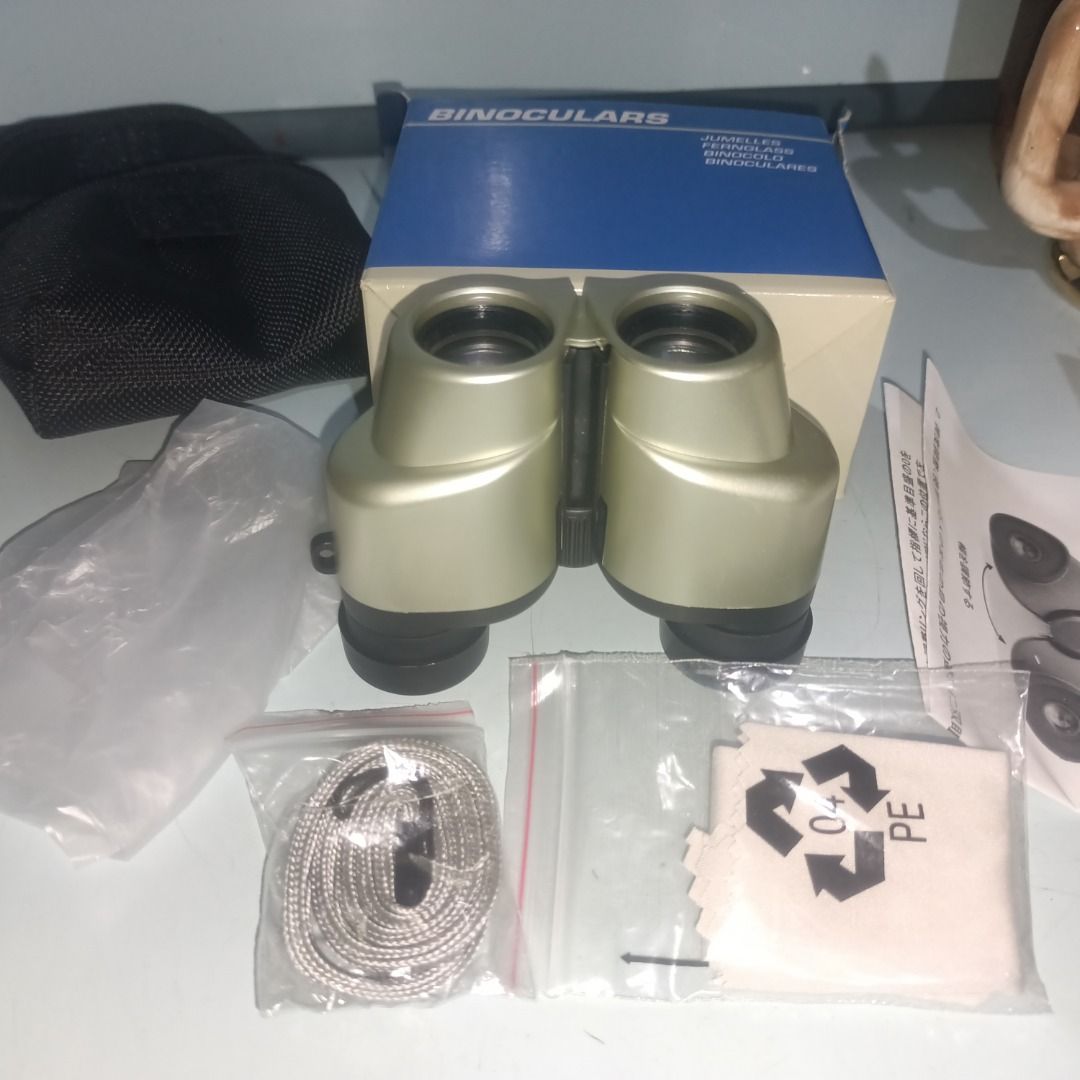 Carton 7x21 Multi Coated Binoculars (Category: Hiking & Camping) located in Munoz. Submitted by larryc1212 (Listing ID 1467676700, Image 3). Description: - Model: Carton 7x21 Binoculars - Optics: Multi-coated lenses with a 7.5-degree field of view - Design: Compact and portable, perfect for outdoor viewing and sports events - Inclusions: Original box, soft case, neck strap, lens cleaning cloth, and instruction manual - Condition: Excellent, compl