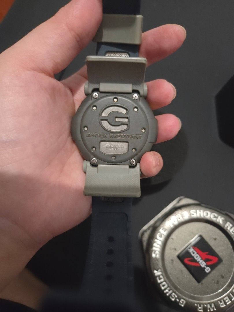 Casio G-Shock, Shock Resist 200 Meter Watch (Category: Men's Watches) located in Quezon City. Submitted by sashasarisarishoppe (Listing ID 1467670620, Image 3). Description: - Authentic Casio G-Shock digital watch - Striking blue and grey design with eye-catching yellow side buttons - Shock resistant structure built for durability - 200-meter water resistance rating for swimming and diving - Multi-functional digital display dial - Includes origin
