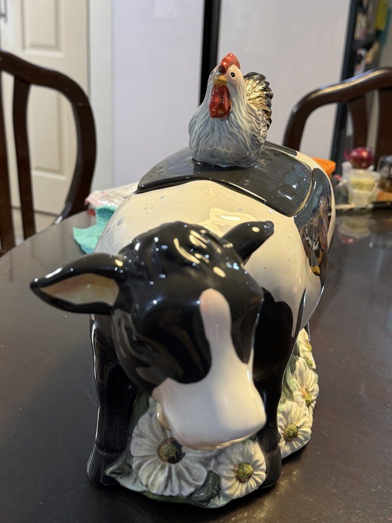 Ceramic Cow and Chicken Cookie Jar (Category: Food Organization & Storage) located in Manila. Submitted by merry.merchant (Listing ID 1467723962, Image 3). Description: - Features a removable lid with a cute little chicken on top - Beautiful glossy finish all over - Perfect decorative and functional piece for your kitchen counter.