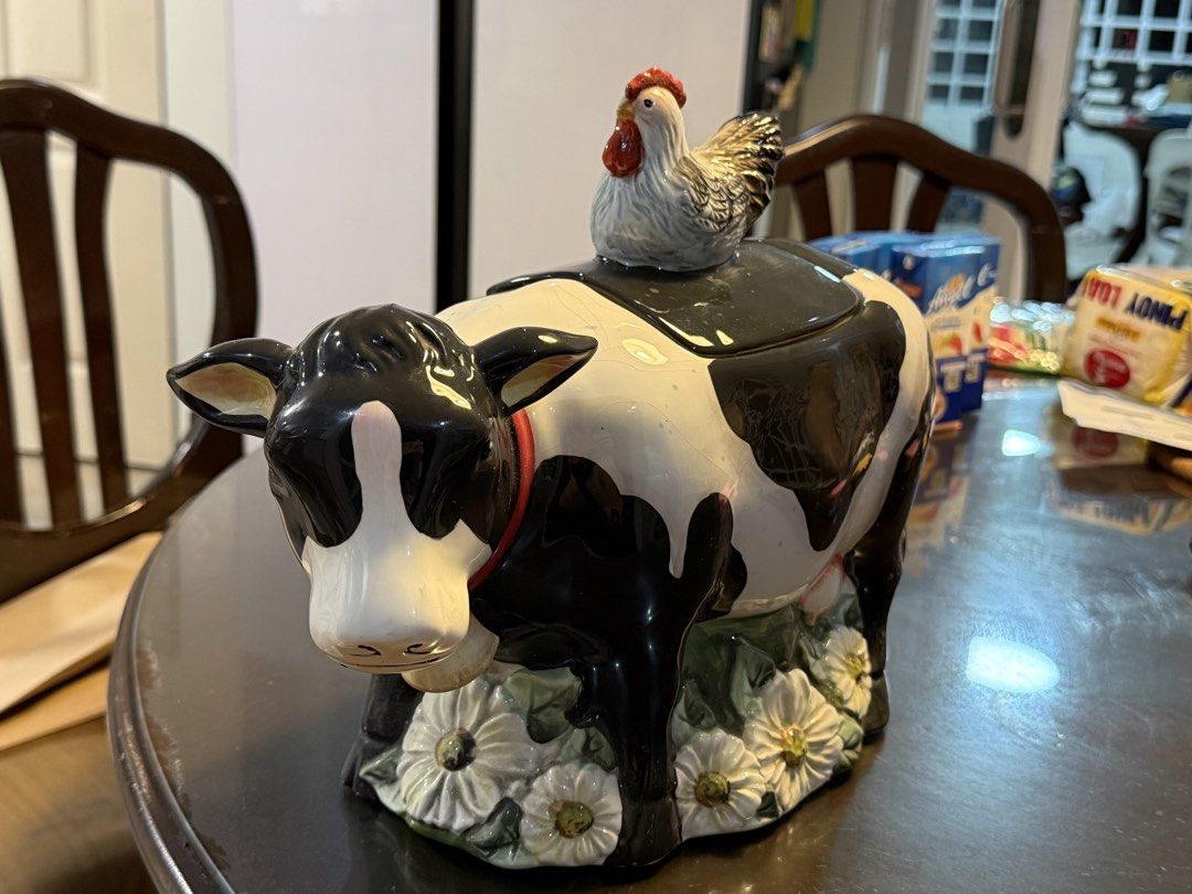 Ceramic Cow and Chicken Cookie Jar (Category: Food Organization & Storage) located in Manila. Submitted by merry.merchant (Listing ID 1467723962, Image 1). Description: - Features a removable lid with a cute little chicken on top - Beautiful glossy finish all over - Perfect decorative and functional piece for your kitchen counter.