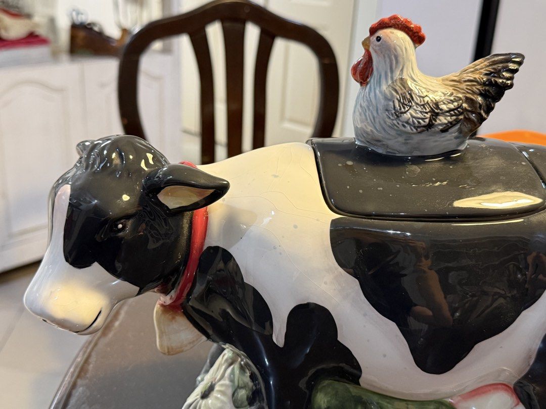 Ceramic Cow and Chicken Cookie Jar (Category: Food Organization & Storage) located in Manila. Submitted by merry.merchant (Listing ID 1467723962, Image 2). Description: - Features a removable lid with a cute little chicken on top - Beautiful glossy finish all over - Perfect decorative and functional piece for your kitchen counter.