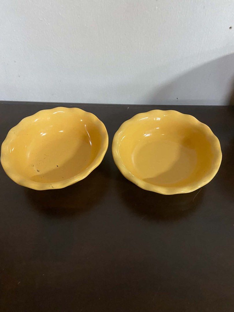 Ceramic Plates Bowls Set Grape and Yellow Design (Category: Dinnerware & Cutlery) located in Quezon City. Submitted by nathaliedychiao (Listing ID 1467735895, Image 3). Description: - Matching ceramic dishware set for rustic table settings or daily meals - Includes 2 cream-centered plates with purple grapes and blue rims - Includes 2 yellow bowls featuring reactive brown-grey glazed rims - Includes 2 yellow bowls with charming ruffled edges - Sol